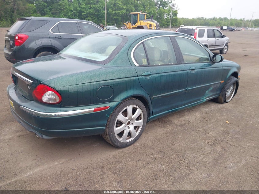 2004 Jaguar X type VIN SAJEA51C74WD67509 IAAI salvage auction — NORMAL WEAR, Salvage (Texas), sold $200 on 2026-07-29 (photo 4)