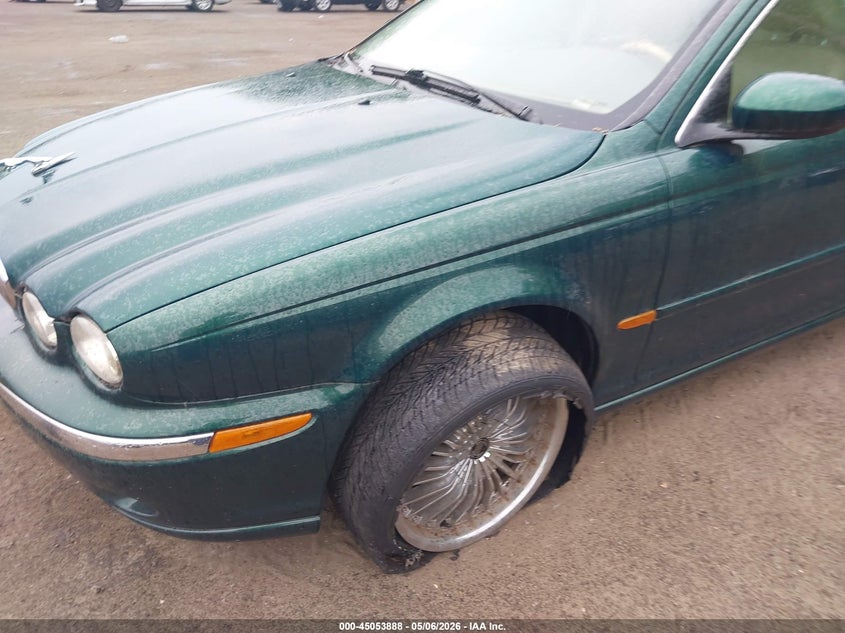 2004 Jaguar X type VIN SAJEA51C74WD67509 IAAI salvage auction — NORMAL WEAR, Salvage (Texas), sold $200 on 2026-07-29 (photo 6)