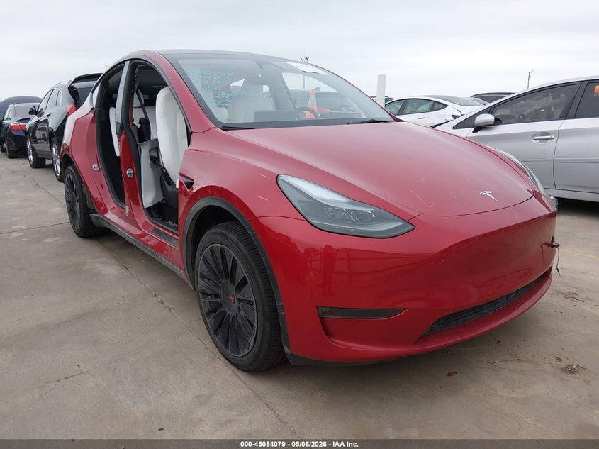 2023 Tesla Model y VIN 7SAYGDEE2PA187747 — IAAI salvage auction photo