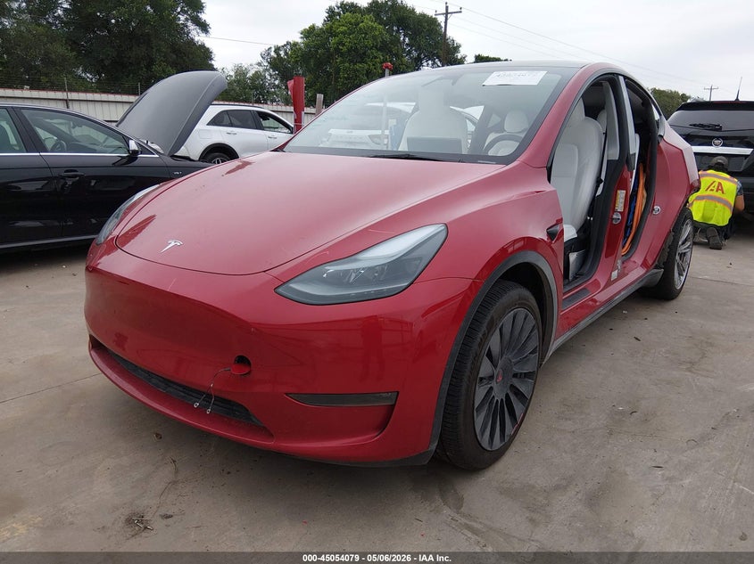 2023 Tesla Model y VIN 7SAYGDEE2PA187747 IAAI salvage auction — LEFT & RIGHT, Original (Texas), sold $13,100 on 2026-09-01 (photo 2)