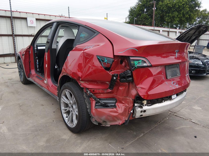 2023 Tesla Model y VIN 7SAYGDEE2PA187747 IAAI salvage auction — LEFT & RIGHT, Original (Texas), sold $13,100 on 2026-09-01 (photo 3)
