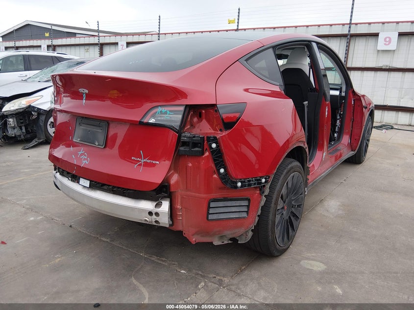 2023 Tesla Model y VIN 7SAYGDEE2PA187747 IAAI salvage auction — LEFT & RIGHT, Original (Texas), sold $13,100 on 2026-09-01 (photo 4)