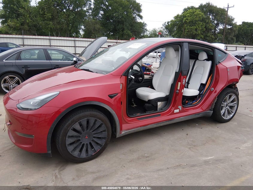 2023 Tesla Model y VIN 7SAYGDEE2PA187747 IAAI salvage auction — LEFT & RIGHT, Original (Texas), sold $13,100 on 2026-09-01 (photo 6)
