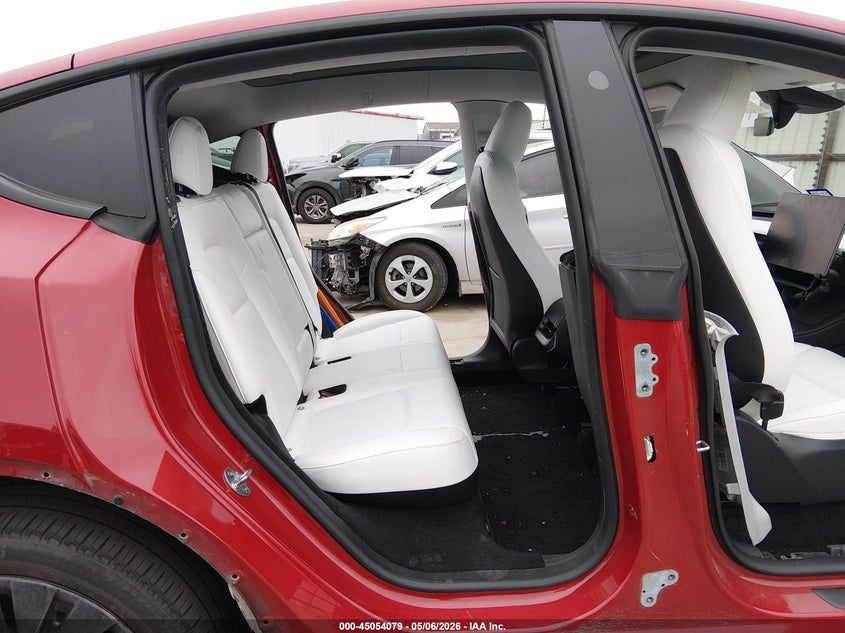 2023 Tesla Model y VIN 7SAYGDEE2PA187747 IAAI salvage auction — LEFT & RIGHT, Original (Texas), sold $13,100 on 2026-09-01 (photo 8)