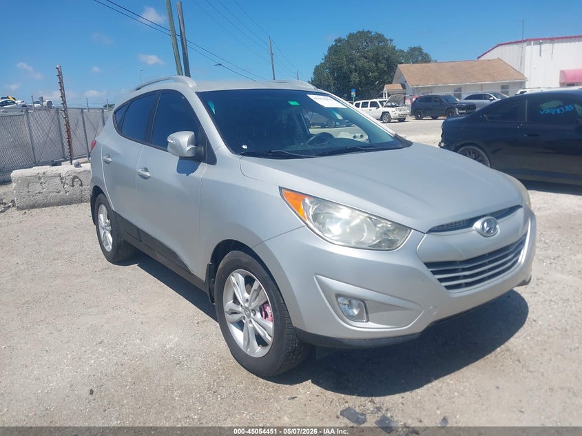 2013 Hyundai Tucson VIN KM8JU3AC1DU645379 IAAI salvage auction — LEFT SIDE, Rebuildable (Florida), sold $2,200 on 2026-07-07 (photo 1)