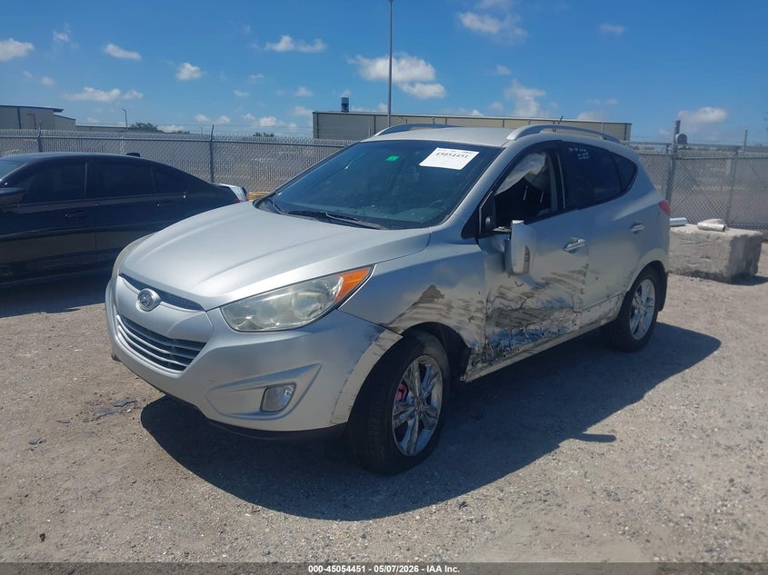 2013 Hyundai Tucson VIN KM8JU3AC1DU645379 IAAI salvage auction — LEFT SIDE, Rebuildable (Florida), sold $2,200 on 2026-07-07 (photo 2)