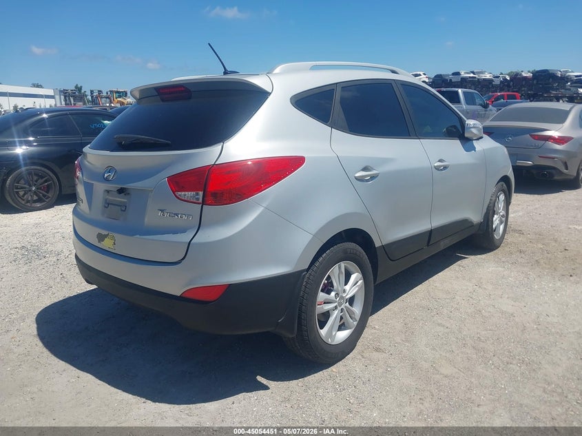 2013 Hyundai Tucson VIN KM8JU3AC1DU645379 IAAI salvage auction — LEFT SIDE, Rebuildable (Florida), sold $2,200 on 2026-07-07 (photo 4)