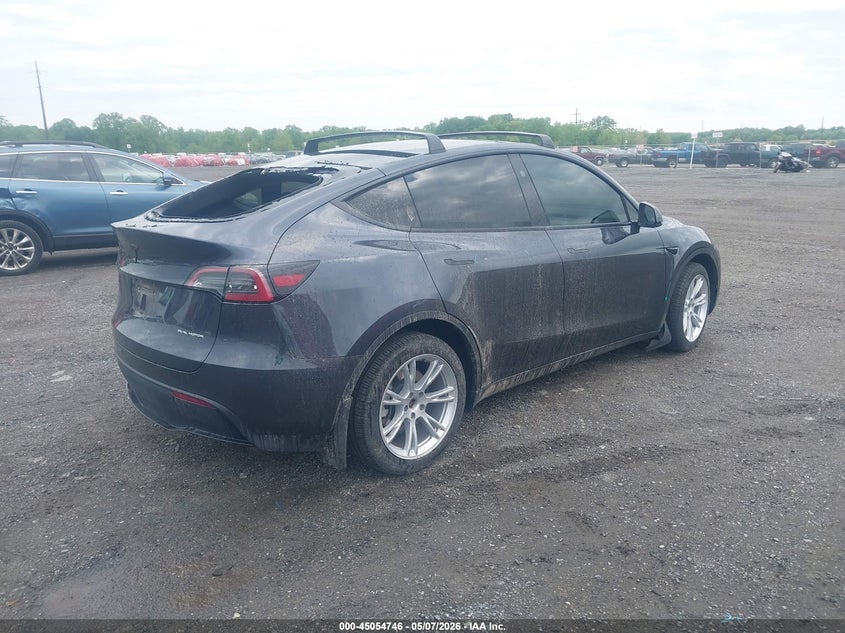2024 Tesla Model y VIN 7SAYGDEE1RA264563 IAAI salvage auction — REAR END, Salvage - 75% Or Less (Maryland), sold $12,550 on 2026-07-09 (photo 4)