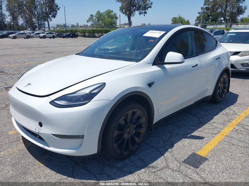2022 Tesla Model y VIN 7SAYGAEE6NF522782 IAAI salvage auction — SIDE, Salvage (California), sold $9,500 on 2026-07-14 (photo 2)