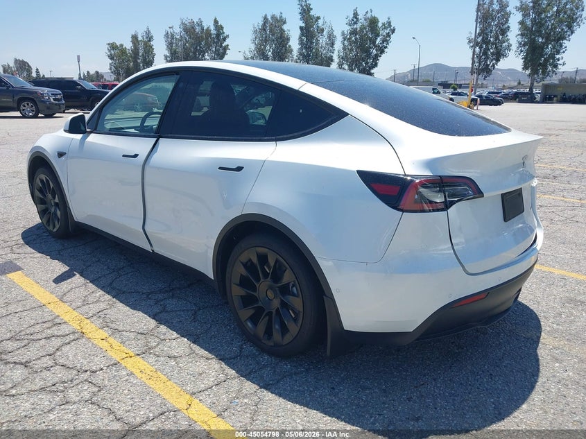 2022 Tesla Model y VIN 7SAYGAEE6NF522782 IAAI salvage auction — SIDE, Salvage (California), sold $9,500 on 2026-07-14 (photo 3)