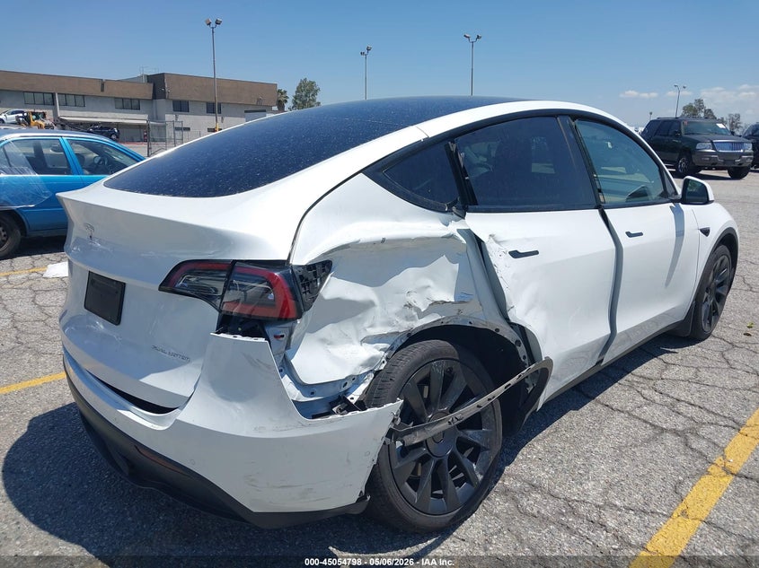 2022 Tesla Model y VIN 7SAYGAEE6NF522782 IAAI salvage auction — SIDE, Salvage (California), sold $9,500 on 2026-07-14 (photo 4)