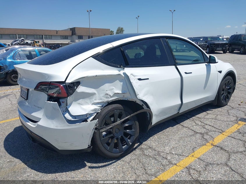 2022 Tesla Model y VIN 7SAYGAEE6NF522782 IAAI salvage auction — SIDE, Salvage (California), sold $9,500 on 2026-07-14 (photo 5)