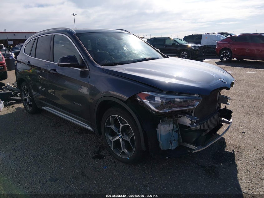 2017 BMW X1 VIN WBXHT3C35H5F73045 IAAI salvage auction — FRONT & REAR, Salvage (Colorado), sold $2,550 on 2026-07-21 (photo 1)