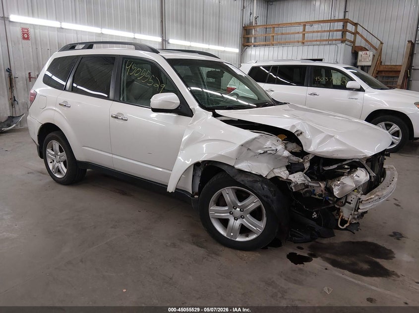 2010 Subaru Forester VIN JF2SH6CC2AH797074 IAAI salvage auction — FRONT & REAR, Prior Salvage (Minnesota), sold $525 on 2026-07-14 (photo 1)