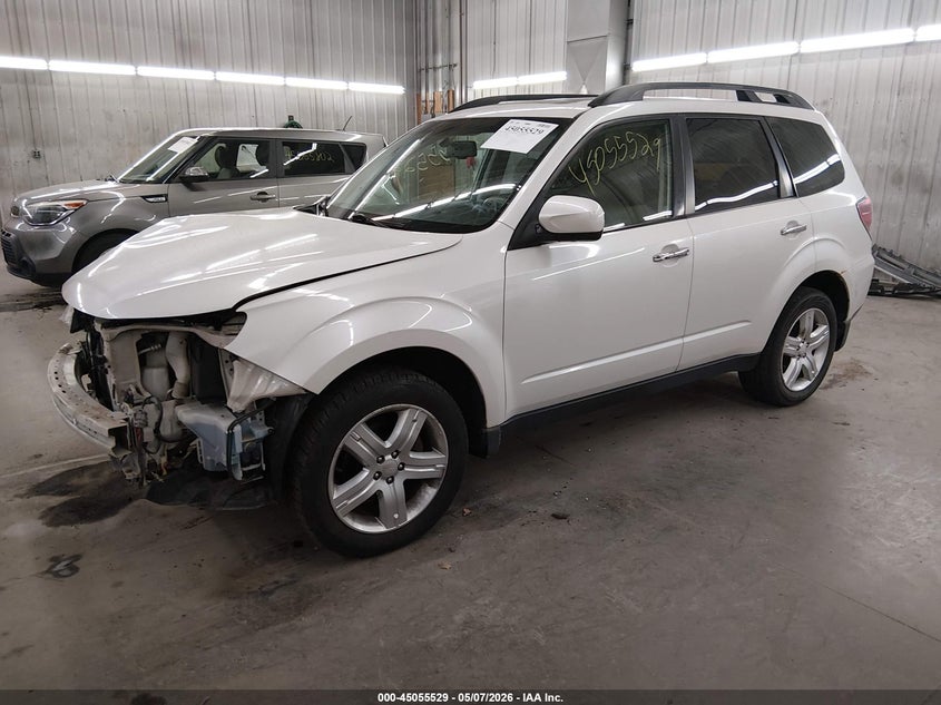 2010 Subaru Forester VIN JF2SH6CC2AH797074 IAAI salvage auction — FRONT & REAR, Prior Salvage (Minnesota), sold $525 on 2026-07-14 (photo 2)