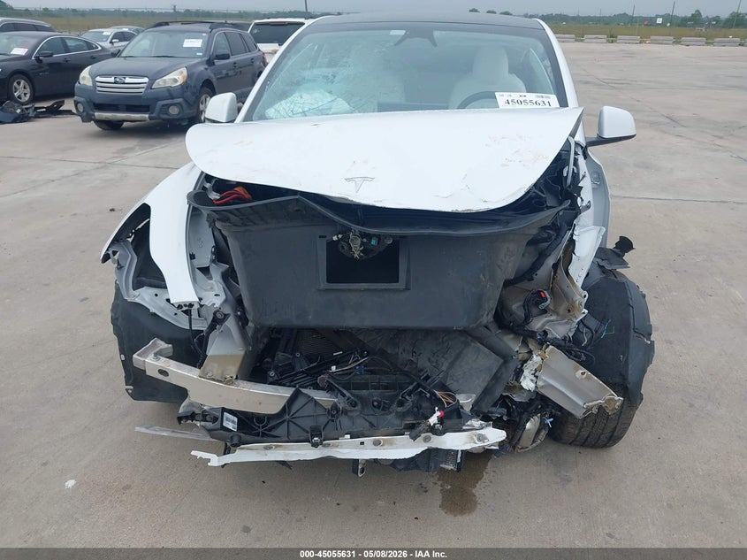2023 Tesla Model y VIN 7SAYGAEE3PF896852 IAAI salvage auction — FRONT END, Salvage (Texas), sold $5,900 on 2026-07-10 (photo 6)