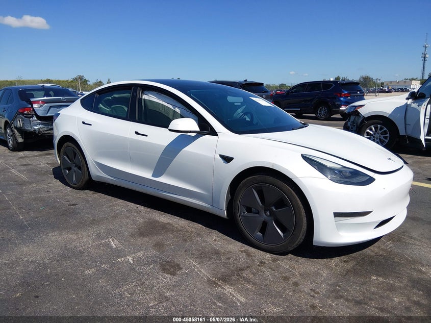 2023 Tesla Model 3 VIN 5YJ3E1EA3PF450095 IAAI salvage auction — SIDE, Rebuildable (Florida), sold $5,750 on 2026-07-09 (photo 1)