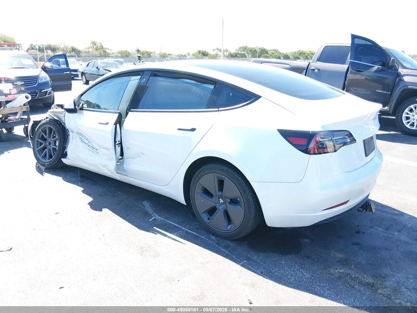2023 Tesla Model 3 VIN 5YJ3E1EA3PF450095 IAAI salvage auction — SIDE, Rebuildable (Florida), sold $5,750 on 2026-07-09 (photo 3)