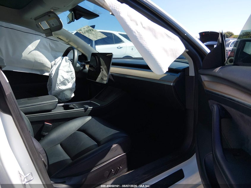 2023 Tesla Model 3 VIN 5YJ3E1EA3PF450095 IAAI salvage auction — SIDE, Rebuildable (Florida), sold $5,750 on 2026-07-09 (photo 5)