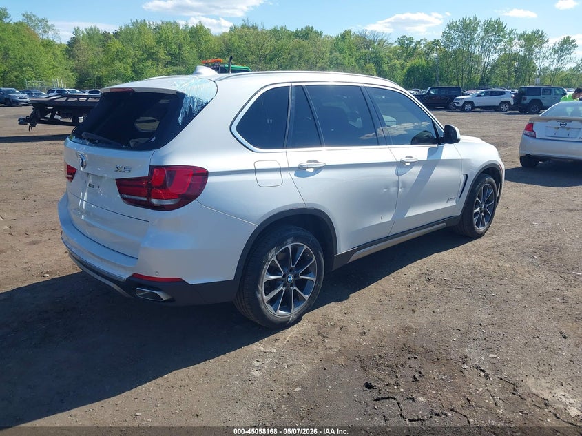 2018 BMW X5 VIN 5UXKR0C50J0X89384 IAAI salvage auction — REAR END, Salvage (Idaho), sold $3,650 on 2026-07-08 (photo 4)