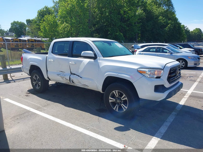 2018 Toyota Tacoma VIN 5TFAX5GN9JX122475 IAAI salvage auction — SIDE, Salvage Title, sold $8,200 on 2026-07-09 (photo 1)