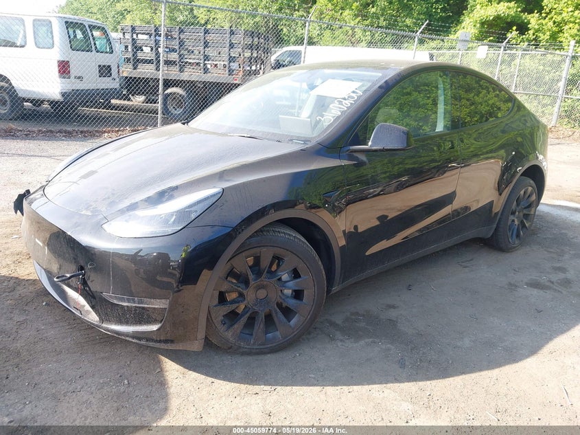 2025 Tesla Model y VIN 7SAYGDED9SA360230 IAAI salvage auction — RIGHT FRONT, Clear (Maryland), sold $10,300 on 2026-07-21 (photo 2)