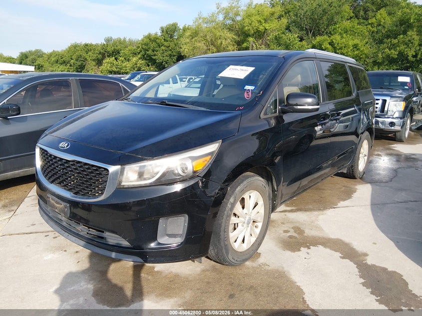 2015 Kia SEDONA VIN KNDMB5C15F6021557 IAAI salvage auction — NORMAL WEAR, Original (Texas), sold $1,100 on 2026-07-13 (photo 2)