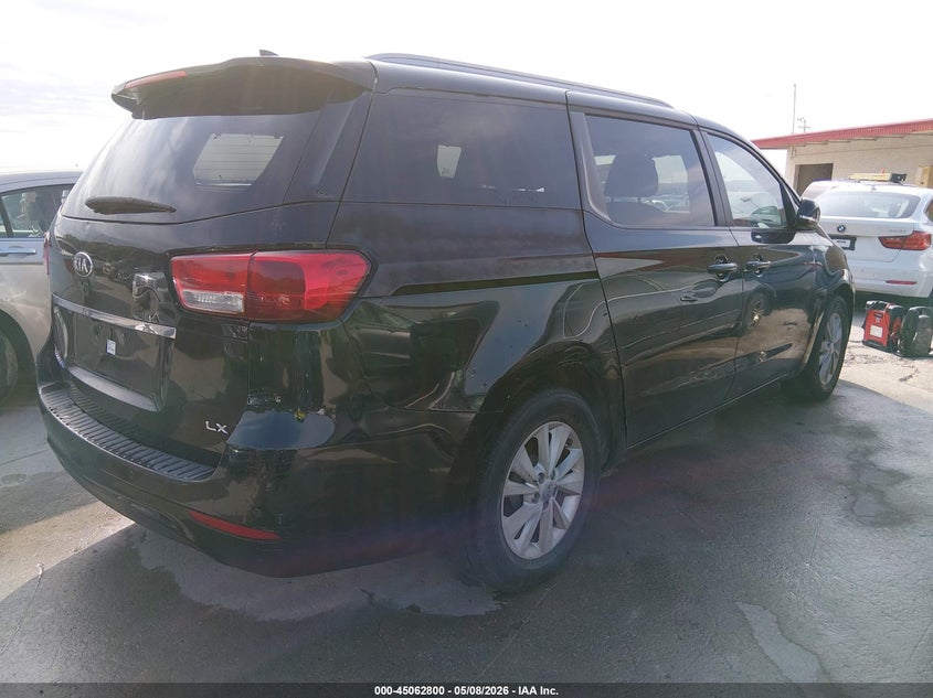 2015 Kia SEDONA VIN KNDMB5C15F6021557 IAAI salvage auction — NORMAL WEAR, Original (Texas), sold $1,100 on 2026-07-13 (photo 4)