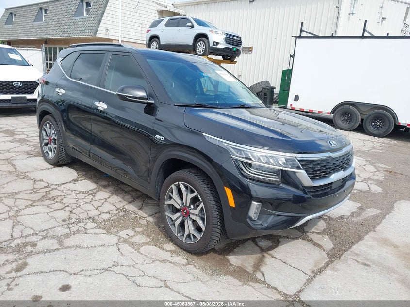 2021 Kia Seltos VIN KNDETCA22M7121446 IAAI salvage auction — LEFT REAR, Salvage (Illinois), sold $5,750 on 2026-07-14 (photo 1)