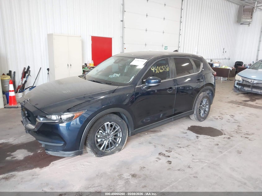 2021 Mazda Cx-5 VIN JM3KFBCM0M1334943 IAAI salvage auction — FRONT & REAR, Salvage (Minnesota), sold $4,000 on 2026-07-29 (photo 2)
