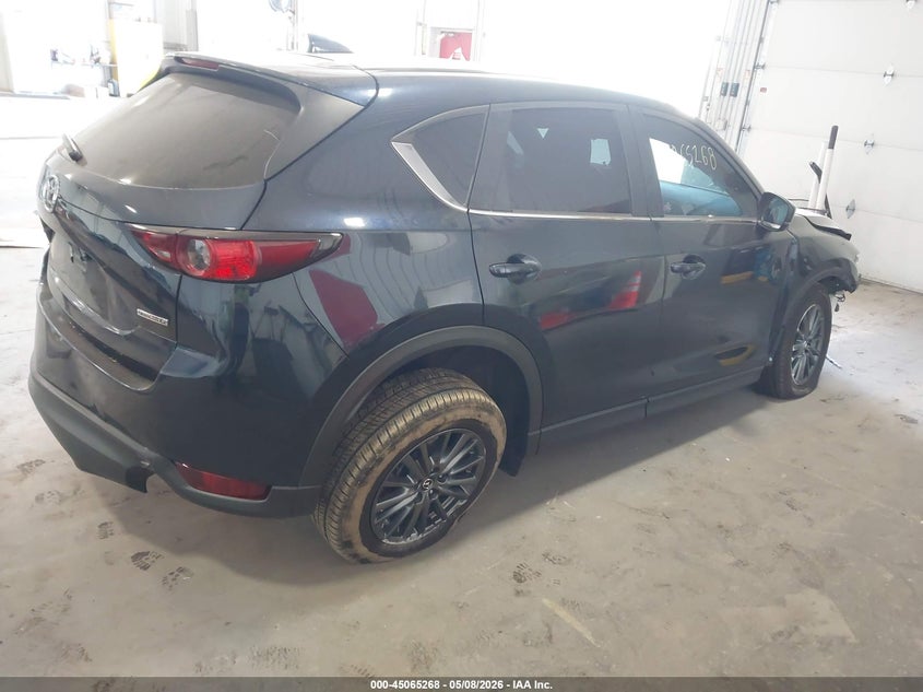 2021 Mazda Cx-5 VIN JM3KFBCM0M1334943 IAAI salvage auction — FRONT & REAR, Salvage (Minnesota), sold $4,000 on 2026-07-29 (photo 4)