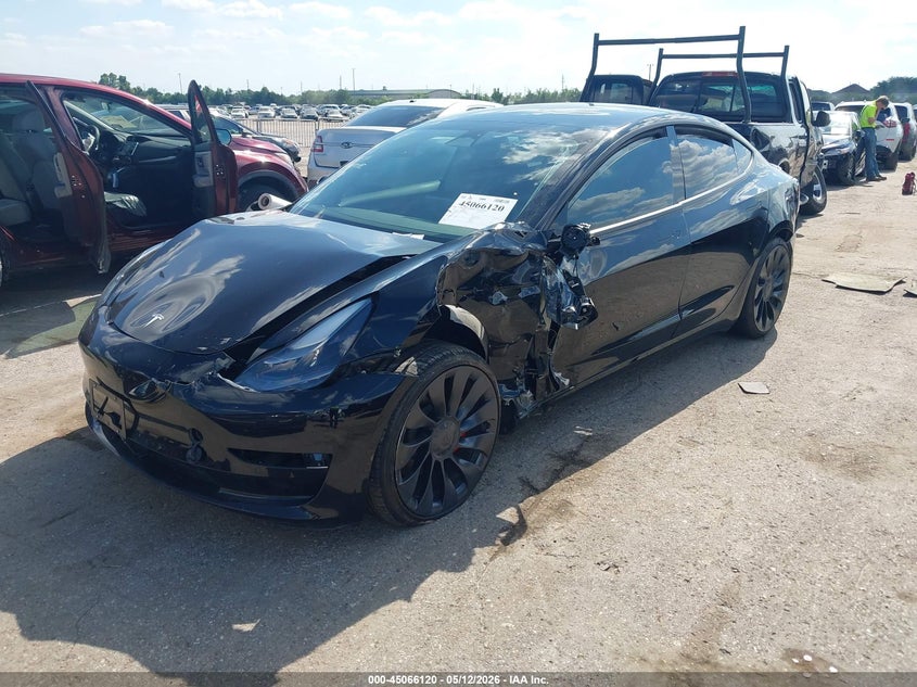 2022 Tesla Model 3 VIN 5YJ3E1EC5NF298156 IAAI salvage auction — SIDE, Salvage (Texas), sold $7,700 on 2026-07-09 (photo 2)