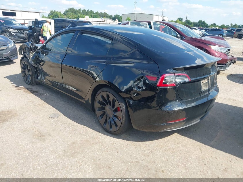 2022 Tesla Model 3 VIN 5YJ3E1EC5NF298156 IAAI salvage auction — SIDE, Salvage (Texas), sold $7,700 on 2026-07-09 (photo 3)