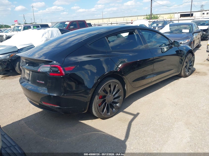 2022 Tesla Model 3 VIN 5YJ3E1EC5NF298156 IAAI salvage auction — SIDE, Salvage (Texas), sold $7,700 on 2026-07-09 (photo 4)