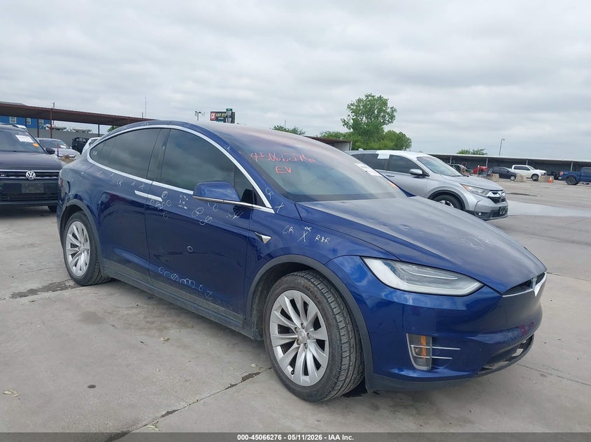 2021 Tesla Model x VIN 5YJXCBE20MF323340 — IAAI salvage auction photo