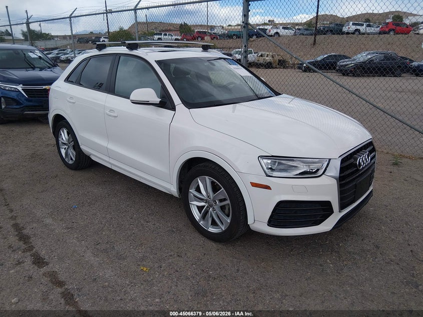 2018 Audi Q3 VIN WA1BCCFS1JR010439 IAAI salvage auction — LEFT SIDE, Clear (New Mexico), sold $2,500 on 2026-07-08 (photo 1)