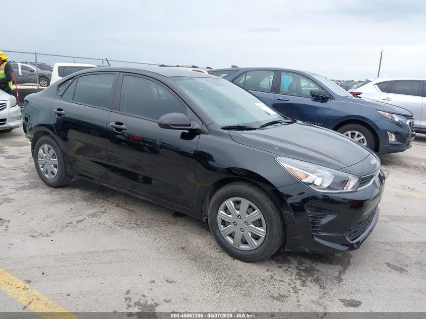 2023 Kia Rio VIN 3KPA24AD1PE619859 IAAI salvage auction — REAR END, Original (Texas), sold $2,400 on 2026-07-09 (photo 1)