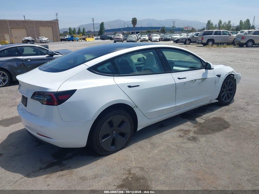 2023 Tesla Model 3 VIN 5YJ3E1EA8PF479804 IAAI salvage auction — LEFT FRONT, Salvage (Arizona), sold $5,100 on 2026-07-06 (photo 4)