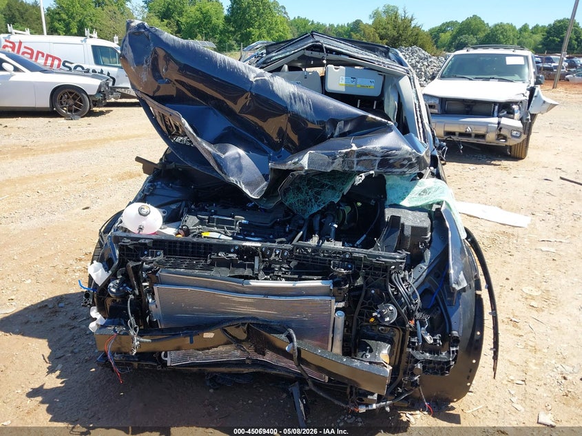 2026 Kia Sportage VIN 5XYK33DF8TG390621 IAAI salvage auction — ROLLOVER, Salvage (North Carolina), sold $1,325 on 2026-07-13 (photo 6)