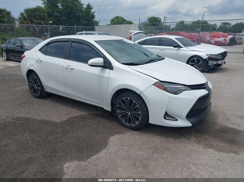 2019 Toyota Corolla VIN 5YFBURHE5KP883443 IAAI salvage auction — LEFT SIDE, Rebuildable (Florida), sold $2,400 on 2026-07-08 (photo 1)