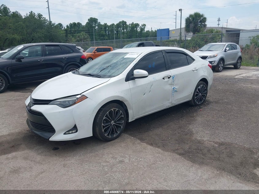 2019 Toyota Corolla VIN 5YFBURHE5KP883443 IAAI salvage auction — LEFT SIDE, Rebuildable (Florida), sold $2,400 on 2026-07-08 (photo 2)
