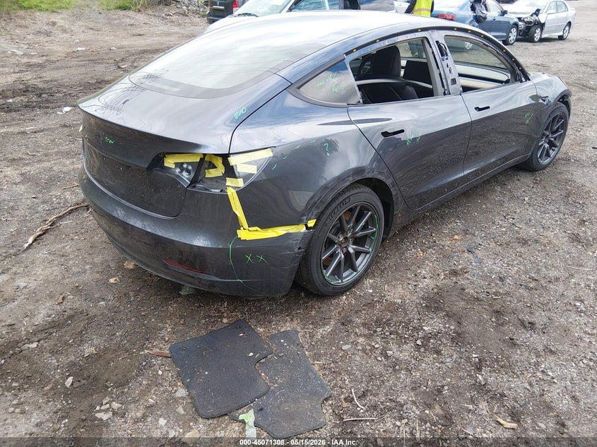 2019 Tesla Model 3 VIN 5YJ3E1EAXKF411318 IAAI salvage auction — REAR END, Salvage (Idaho), sold $3,750 on 2026-07-11 (photo 4)