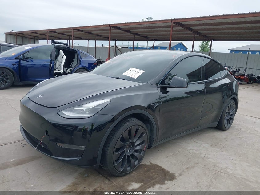 2021 Tesla Model y VIN 5YJYGDEFXMF258312 IAAI salvage auction — RIGHT REAR, Original (Texas), sold $8,500 on 2026-07-08 (photo 2)