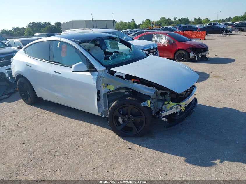 2026 Tesla Model y VIN 7SAYGDED5TA680128 IAAI salvage auction — FRONT & REAR, Salvage (Texas), sold $16,750 on 2026-07-16 (photo 1)