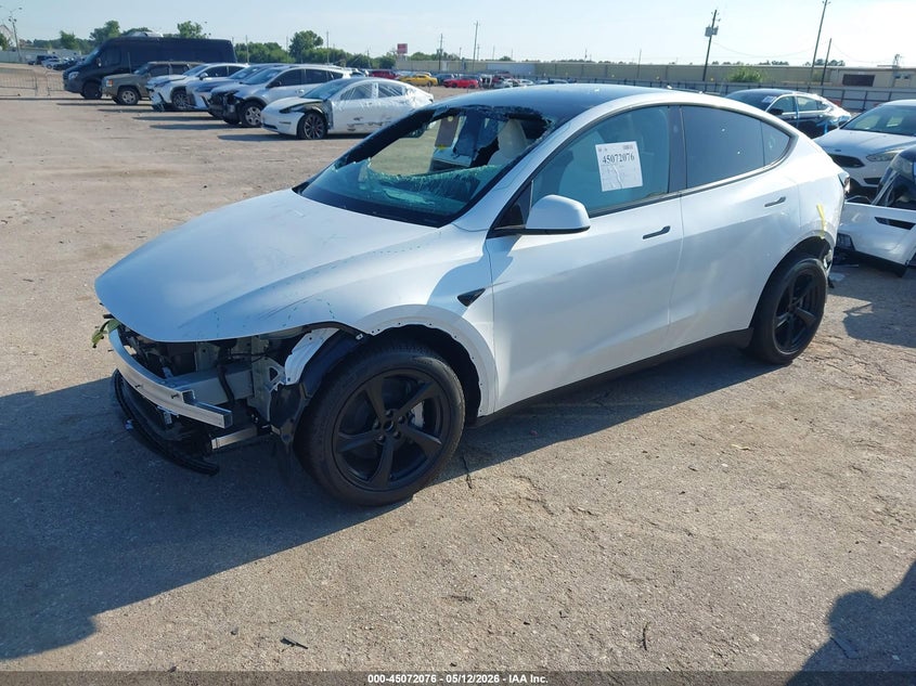 2026 Tesla Model y VIN 7SAYGDED5TA680128 IAAI salvage auction — FRONT & REAR, Salvage (Texas), sold $16,750 on 2026-07-16 (photo 2)