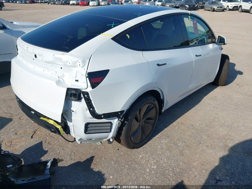 2026 Tesla Model y VIN 7SAYGDED5TA680128 IAAI salvage auction — FRONT & REAR, Salvage (Texas), sold $16,750 on 2026-07-16 (photo 4)