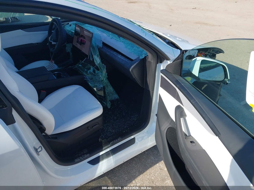 2026 Tesla Model y VIN 7SAYGDED5TA680128 IAAI salvage auction — FRONT & REAR, Salvage (Texas), sold $16,750 on 2026-07-16 (photo 5)
