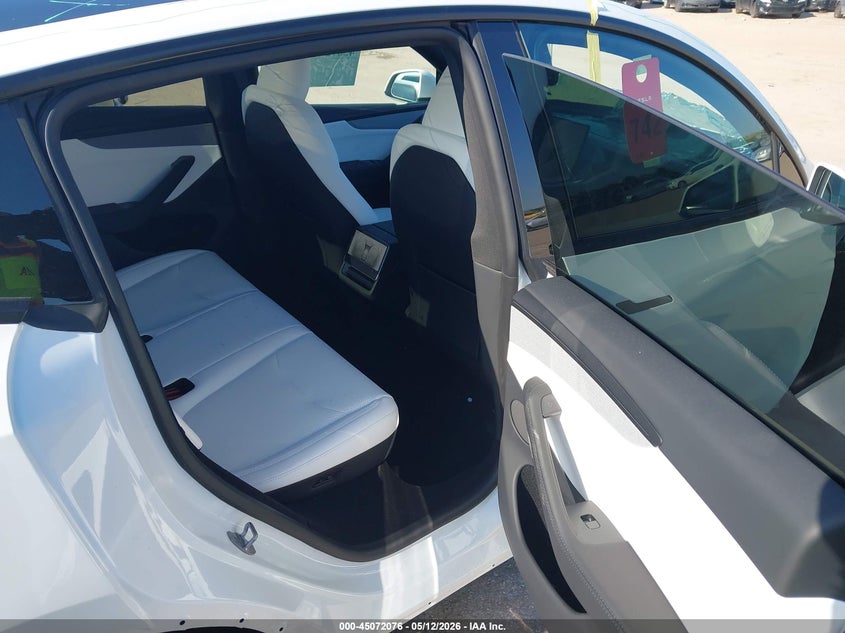 2026 Tesla Model y VIN 7SAYGDED5TA680128 IAAI salvage auction — FRONT & REAR, Salvage (Texas), sold $16,750 on 2026-07-16 (photo 8)