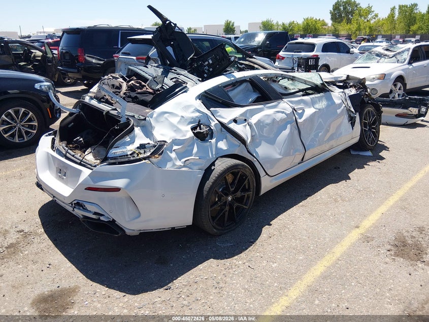 2022 BMW 8er VIN WBAGV8C0XNCK19108 IAAI salvage auction — ALL OVER, Salvage Title, sold $3,300 on 2026-08-04 (photo 4)