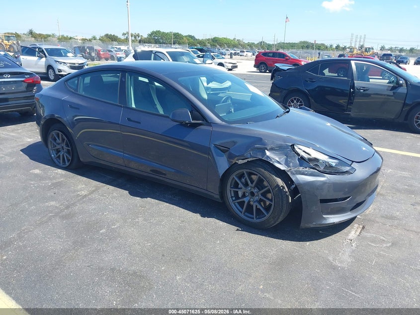 2023 Tesla Model 3 VIN 5YJ3E1EA7PF566545 IAAI salvage auction — LEFT SIDE, Rebuildable (Florida), sold $5,900 on 2026-07-29 (photo 1)